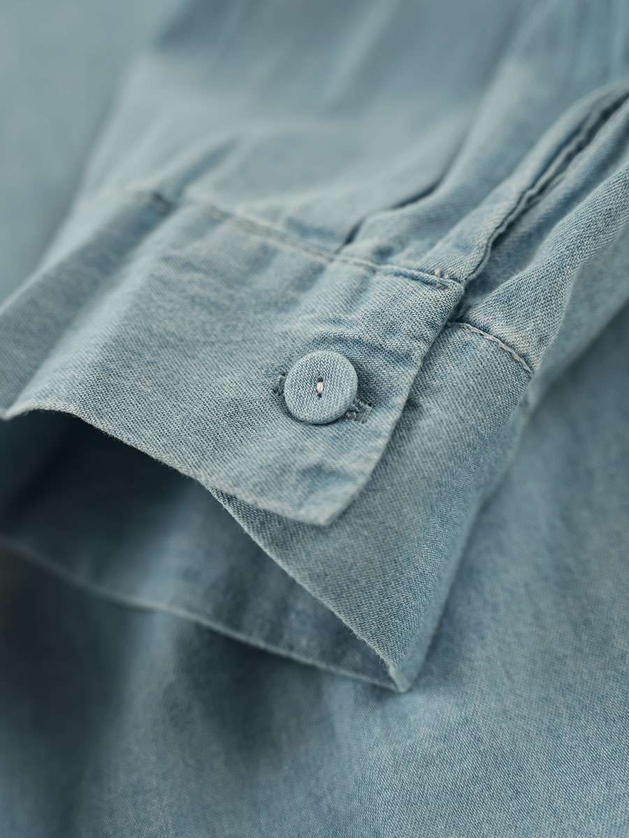 花刺繍の優美なデニムブラウス
